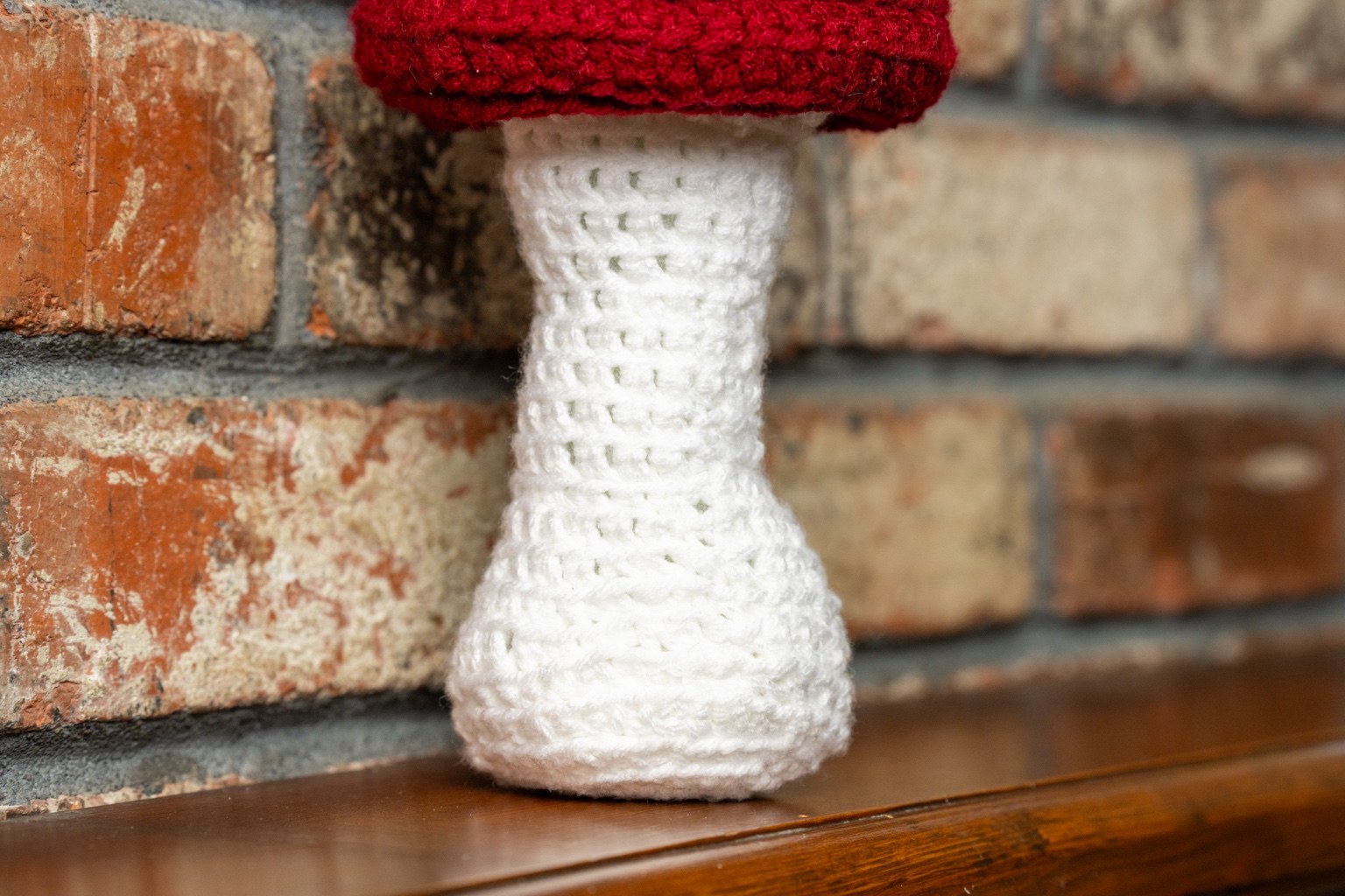 Close-up of white crochet mushroom stem
